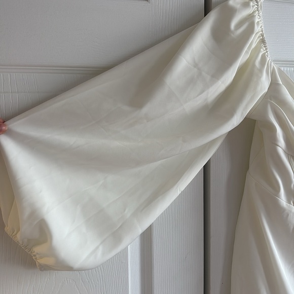 White mini dress with puffy sleeves form princess poly worn once to homecoming - Picture 4 of 4